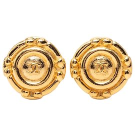 Pendientes redondos de clip en oro dorado de Chanel Dorado