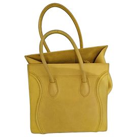 Céline Phantom em couro amarelo. Item usado em perfeito estado Amarelo
