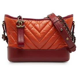 Chanel Bolsa de ombro pequena em couro de cordeiro chevron Gabrielle laranja Laranja