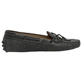 Graue Leder Slipper mit Echsenprägung von Tod's mit Schleife Grau