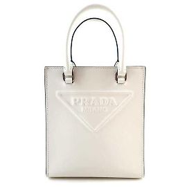Prada Bolsa transversal com logo em relevo Saffiano Branco