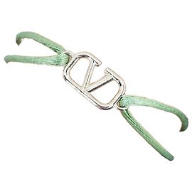 Valentino Bracciale con nodo firma e logo Arancione