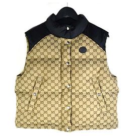 Gucci Chaleco Puffer de Lona Dorado