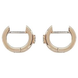 Tory Burch Orecchini Huggie D'oro