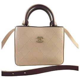 Chanel Bolsa de ombro com alça superior e crossbody Laranja
