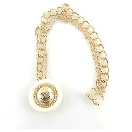 Chanel Broche de corrente com moedas CC Multicor