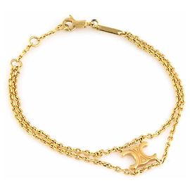 Céline Pulsera de charm de metal dorado Celine Triomphe Dorado