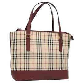 Burberry Nova Check
Lona Nova Check e couro Bege