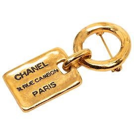 Spilla Tag Rue Cambon Placcata Oro Chanel D'oro