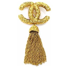 Broche de metal dourado Chanel Dourado
