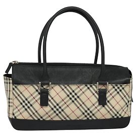 Burberry Nova Check
Toile Nova Check et cuir Beige