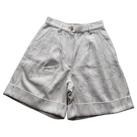 Bermuda Gucci com padrão GG Bege