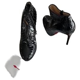 Christian Louboutin Black python leather Louboutin ankle boots Black