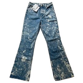Calça flare Ganni 'Betzy' em denim desbotado Azul