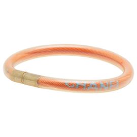 Pulseira da linha esportiva com logo da Chanel Laranja