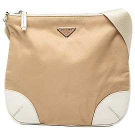 Bolsa transversal Prada em tessuto bege com detalhes em couro. Bege