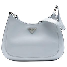 Bolsa de ombro Cleo em couro spazzolato azul da Prada Azul Azul claro