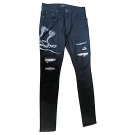 Jeans Amiri pretos com serpentes e rasgos Preto