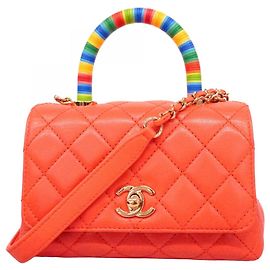 Bolsa Chanel Coco Handle XXS Rosa