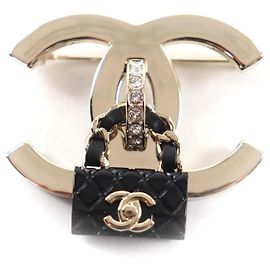 Spilla per borsa Chanel B23C Coco Mark Nero D'oro