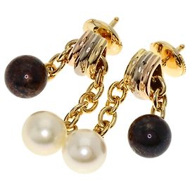 Orecchini in perla Trinity di Cartier D'oro