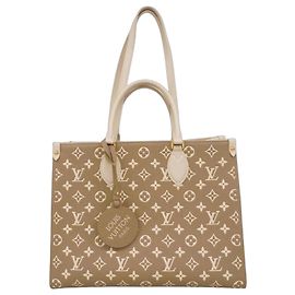 Borsa tote OnTheGo MM in Monogram Empreinte Louis Vuitton Beige Cachi