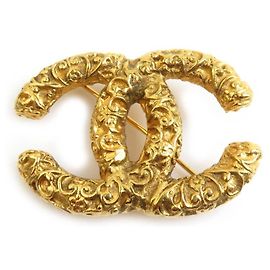 Broche en métal doré Chanel Doré