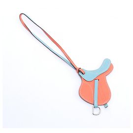 Hermès Accessorio charm Paddock Cell Hermes Blu Arancione