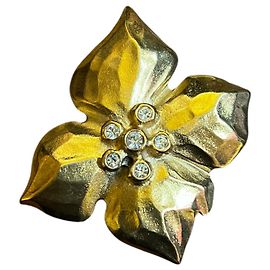 Yves Saint Laurent Broche flor dorada YSL Otro