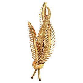 Autre Marque Broche "branche de palmier" en or jaune 18K, avec or ciselé et texturé. Autre
