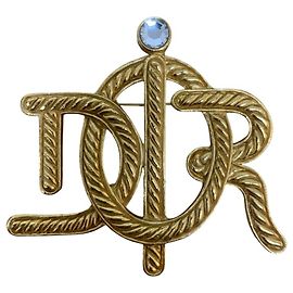 Broche Christian Dior en métal doré et strass Autre