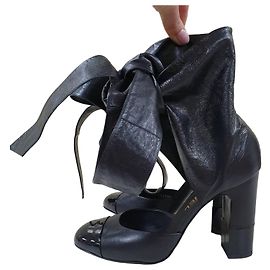Sandali con tacco in pelle nera Chanel con lacci Taglia 38 Usato Altro