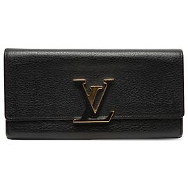 Cartera larga Capucines en taurillon negro Louis Vuitton Negro