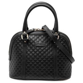 Gucci Schwarze Mini Microguccissima Dome-Handtasche Schwarz