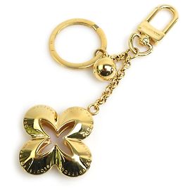 Charm de bolsa dourada Louis Vuitton Dourado