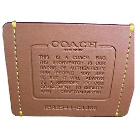 Mochila de couro khaki Coach Caqui
