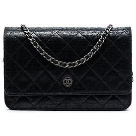 Cartera con cadena de cuero charolado acolchado Chanel CC Negro