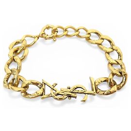 BRACELET YVES SAINT LAURENT CASSANDRE 851103 GOURMETTE METAL DORE BANGLE Doré