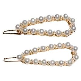 Espléndida pareja de joyas para el cabello DOLCE & GABBANA Colección “Devotion” Blanco Dorado