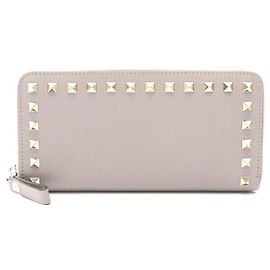 Valentino Garavani Portefeuille long en cuir Rockstud de Valentino Gris
