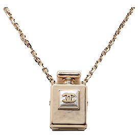 Pendentif en forme de flacon de parfum Chanel CC en or plaqué doré Blanc Autre