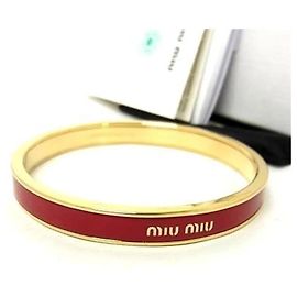 Bracciale in metallo rosso e oro Miu Miu Rosso D'oro