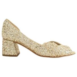 Patricia Blanchet Golden heels Golden