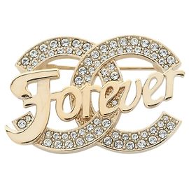 Broche Acessório Coco Mark da Chanel Dourado Outro