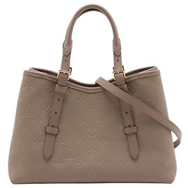Bolso Tote Babylone PM en Monogram Empreinte beige de Louis Vuitton Beige