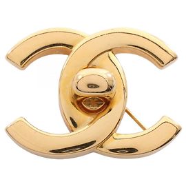 Chanel Coco Mark Turnlock Motiv Brosche Golden