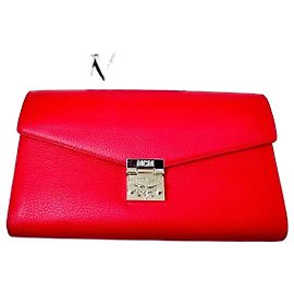 Red leather clutch with MCM logo Red
