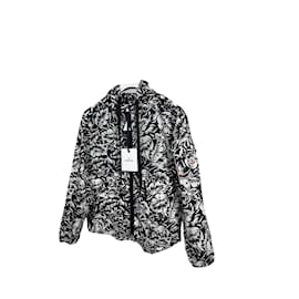 Giacca con cappuccio tropicale nera e bianca Moncler Nero Bianco