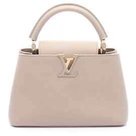 Borsa Capucines BB Louis Vuitton Beige Altro