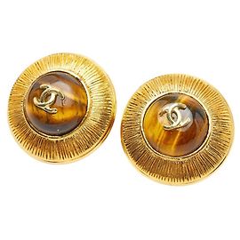 Boucles d'oreilles rondes à clip Coco Mark Vintage de Chanel Doré Jaune